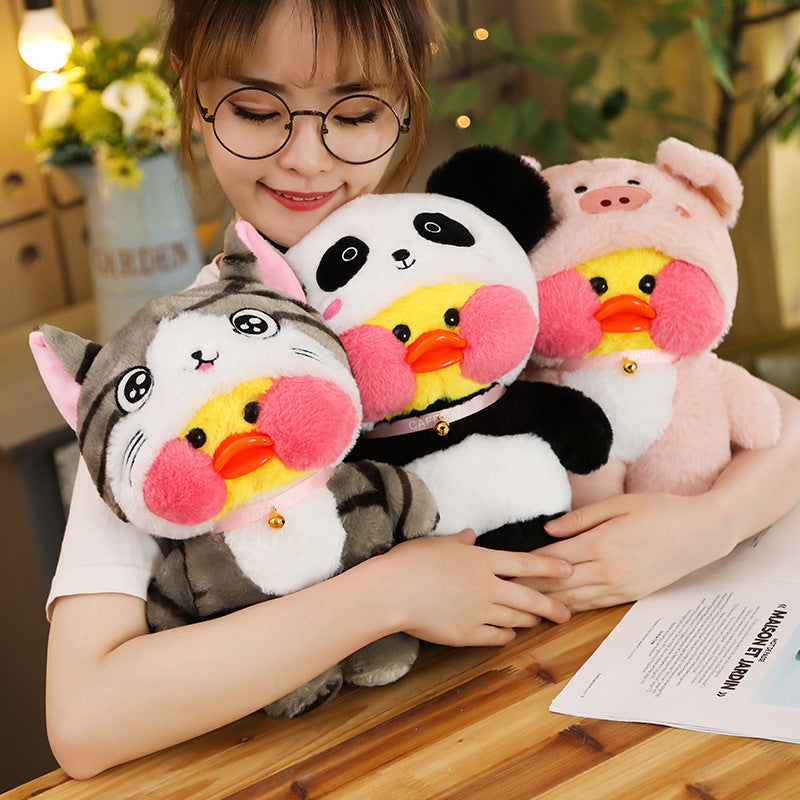 Canard Kawaii avec des jouets en peluche de poupée de costume d'animaux mignons