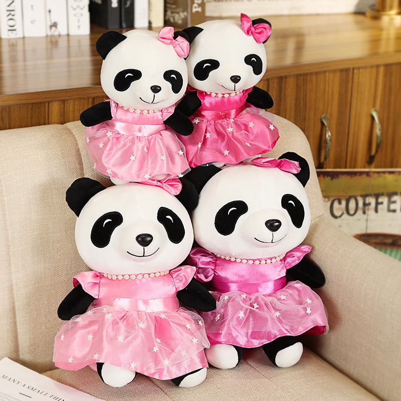 Kawaii portant des jouets en peluche mignons de poupée de panda de jupe